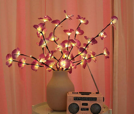 Kezaro white orchid branch with light, realistic artificial flowering orchid for home or event decor.